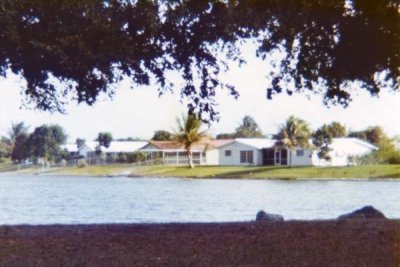 1976 - ground level view of home we bought (left, red roof) and Dr. Potter's home (right)
