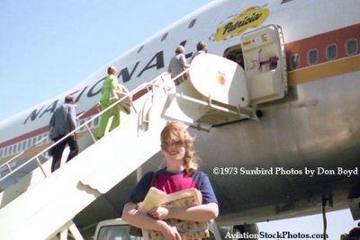 1973 - windblown stair truck boarding National Airlines B747-135 N77772 Patricia at LAX