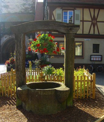 OLD WELL BY THE ARCHWAY