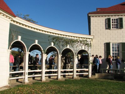 Visitors wait in line to enter the mansion. Photography is not allowed inside.