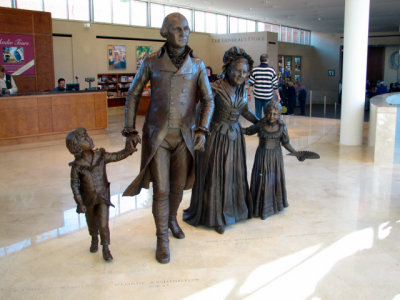 Visitors can stand next to life-size statues of George and Martha Washington and their grandchildren.