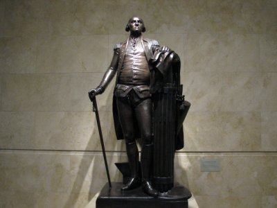 A statue of Washington towers over the lobby of the museum and education center. Photography allowed in center, not in museum.
