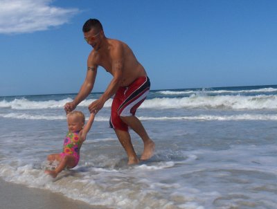 annie and daddy at the beach