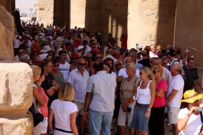 Travel Guide talking to Tourists at Karnak Temple, Luxor (Egypt)