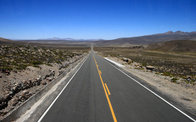 Endless road in Peruvian desert