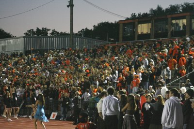 large homecoming crowd in brown stadium