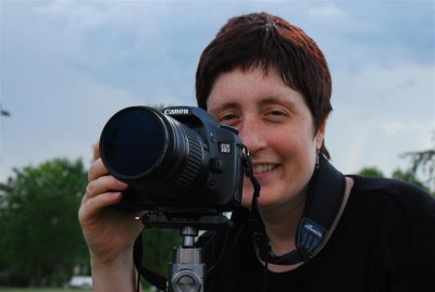 Julie with big black lens.