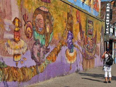 Close-up of Os Gemeos's graffiti/mural on wall outside Coney Island train station