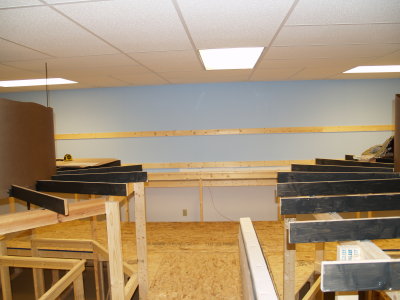 View looking back towards far long wall of the basement.