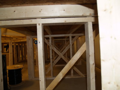 View showing supports for the 4 foot high platform to access the middle and upper level.