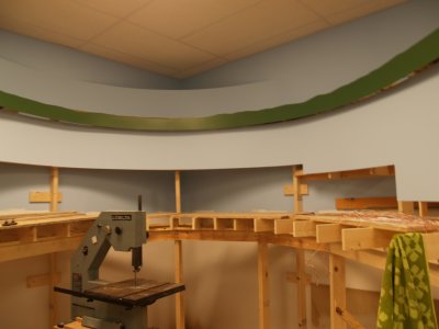 View of the upper deck Big Curve and the benchwork for the grade from the lower to middle decks.