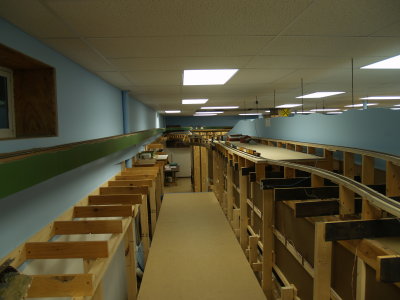 View down short upper deck aisle to basement entrance.