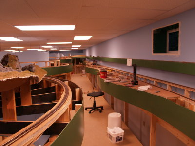 View of the main aisle on the platform showing the completed Middle Level mainline track on the right.