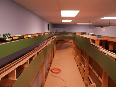 View down the short aisle of the platform showing the completed Middle Level tracks with passing siding on the left.