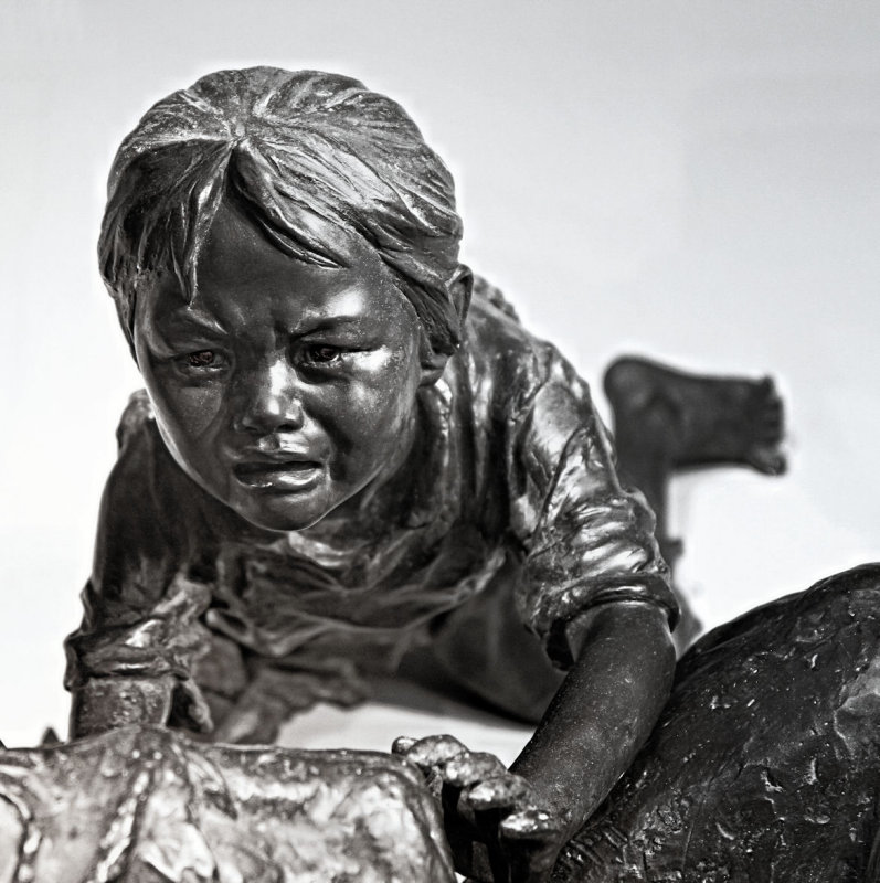 a child...distraught and crying about his desperate mother