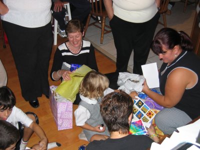 All 3 birthday kids opening presents