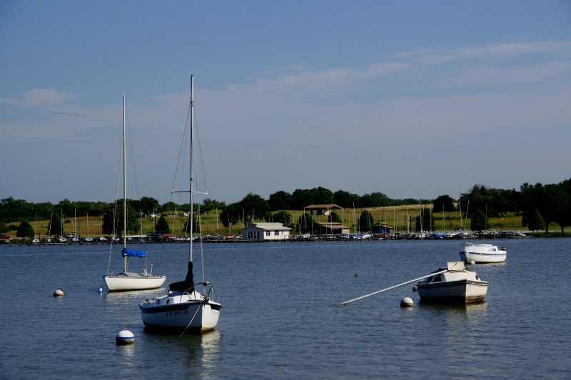 SAILBOATS AT A LAKE ALONG THE WAY