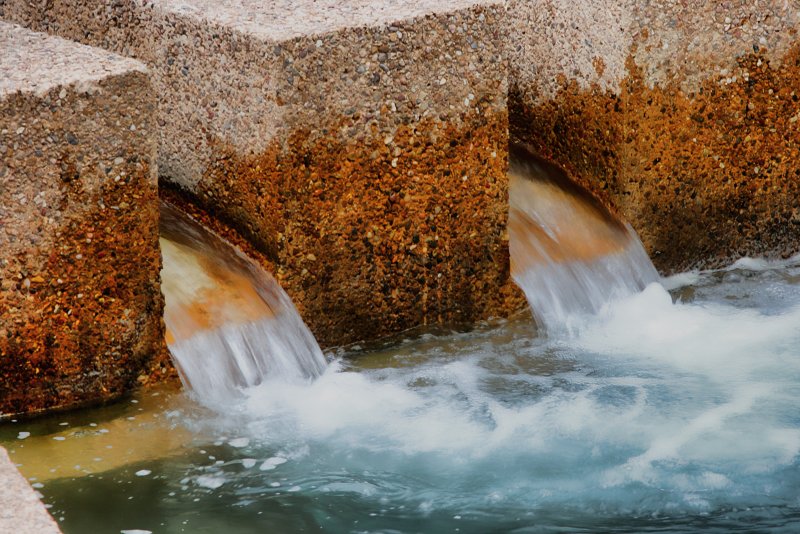 WATER FLOWING AT THE BOTTOM OF THE ACTIVE WATER GARDEN