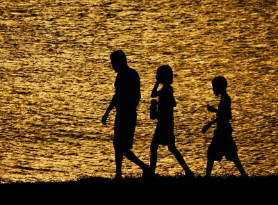 THREE WALKING SILHOUETTES