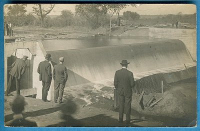 Men inspecting Dam