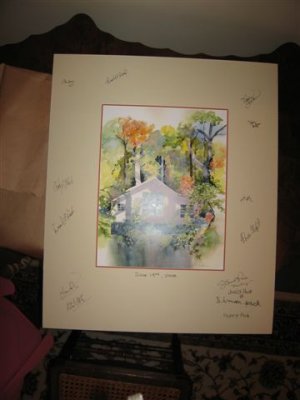 guest signed the matting on this print of one of the cottages (instead of a guest book)
