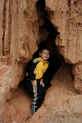Isaiah Exploring a cave in Samaipata