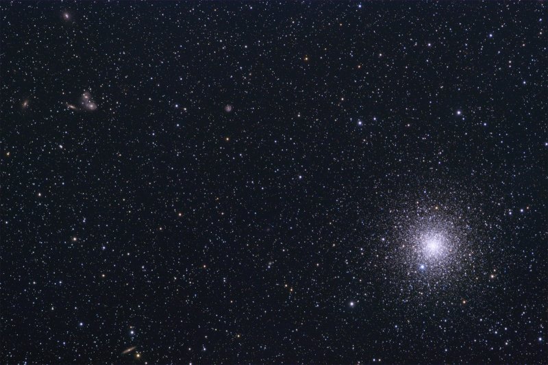NGC 6752 and interacting galaxy group in Pavo (60% size)