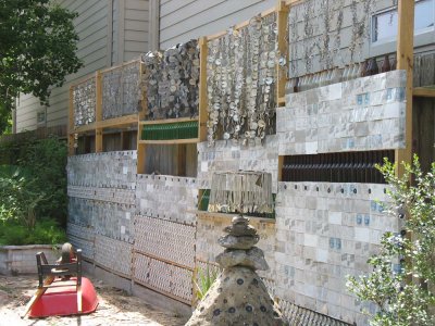 Beer Can House driveway wall