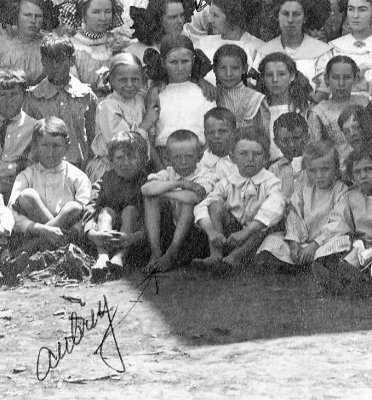 c. 1910: Trent, TX. Dad the barefoot schoolboy, center front row. Detail from original print.