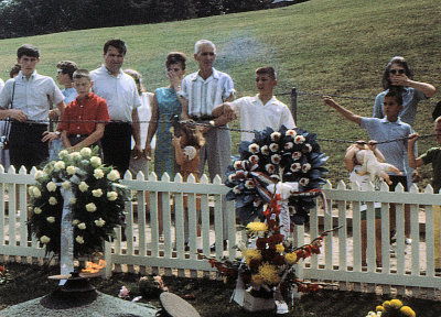 1965: Arlington, VA. JFK grave. Far left: Cousins Tony and Frank.  Far right: Mom (hand over mouth).