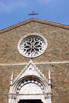 Bat wings on a church in Montalcino 3.jpg