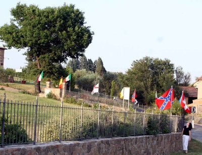 Ania observes flags flying in Pienza.jpg