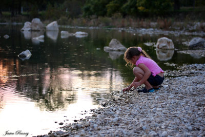 My daughter looking for tadpoles along the Frio River