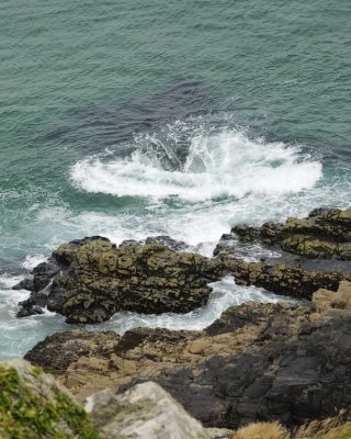 love watching patterns formed by waves breaking over isolated rocks