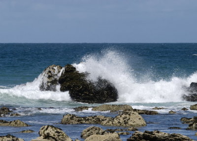 waves breaking over rocks