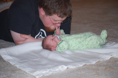 Nathan picking Dad's nose.  :-)