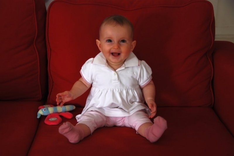 Maya on the red sofa.6.
