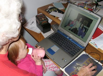 Viewing photo of mom & sisters in England