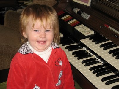 Lia proudly playing the organ