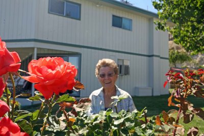 87 Year Old  Betty Cooper  Enjoying Her Flower Garden ALong Chelan's Shore