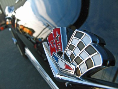 Emblem and Side View Of  65 Vette