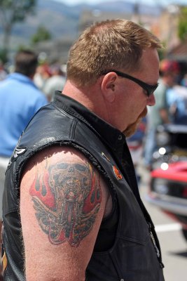  Biker Enjoying Vintage Cars