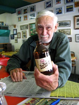 Ardenvoir Local   The Late Tom  Allen  Holding Last Remaining Stock Of BuckHorn Beer