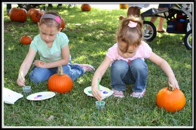 Painting their pumpkins