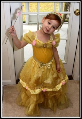 Kylie is Belle from Beauty and The Beast. (In some weird twist of fate, Belle has acquired a magical wand)