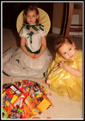 Noelle and Kylie with their mountain of candy
