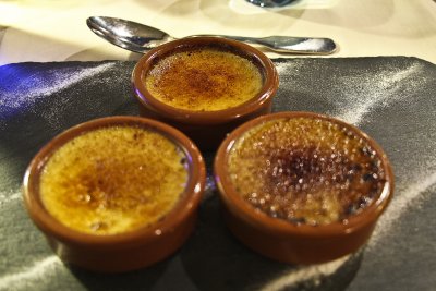 Creme brulee: vanilla, rose, lavendar served on a piece of slate with sugar garnish