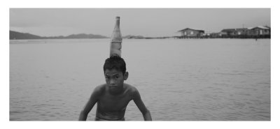 Boy with bottle, Kota Kinabalu, Malaysia