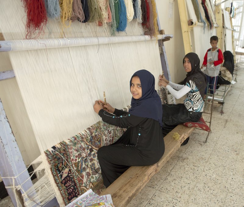 Kids making carpets