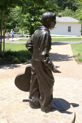 Bronze statue of Elvis on a sunny day